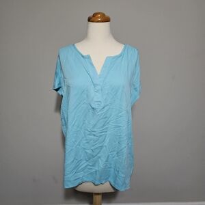 Nine West light blue short sleeve top. Soft slub knit fabric with a split V-neck